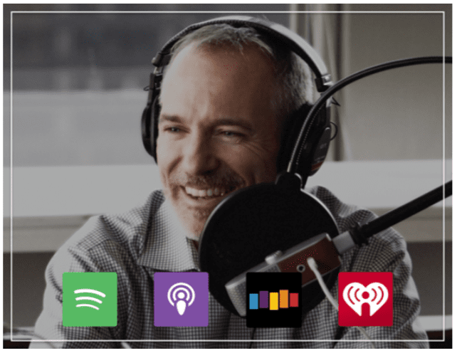 man smiling with microphone