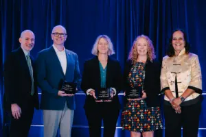 Dr. Graham McMahon (far left) and Dr. Annette Donawa (far right) were honored to present the inaugural ACCME Pinnacle Awards.